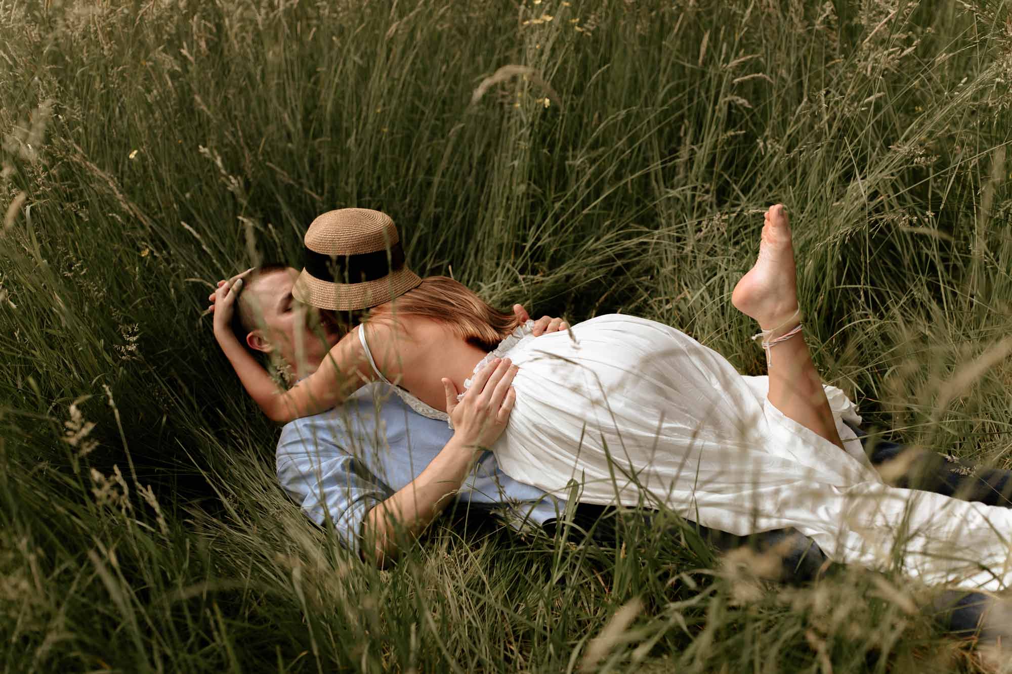 couple in tall grass