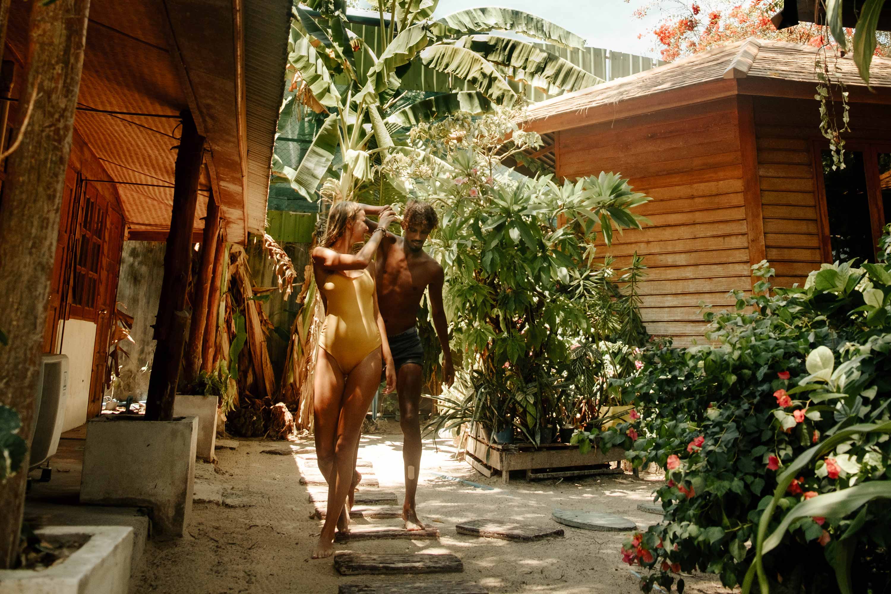 couple in jungle bungalos